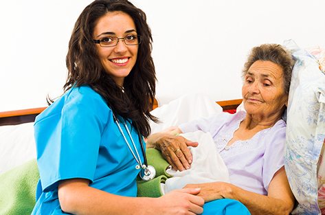 bigstock-Nurse-Caring-For-Elder-Patient-53344120